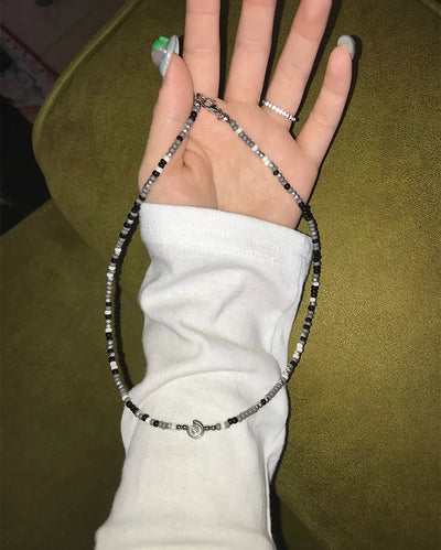 Asymmetrical Black Ball Bead Necklace