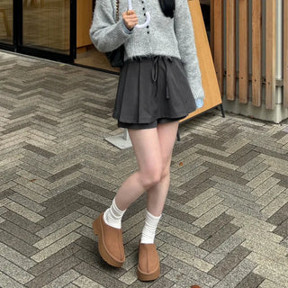 Waist ribbon pleated mini skirt