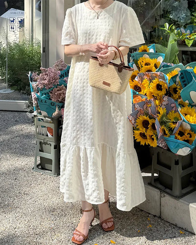 Long dress with ruffled hem