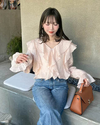 Ruffled V-neck blouse