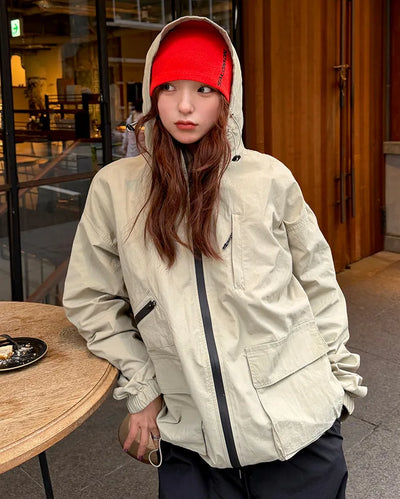 Hooded windbreaker with pockets