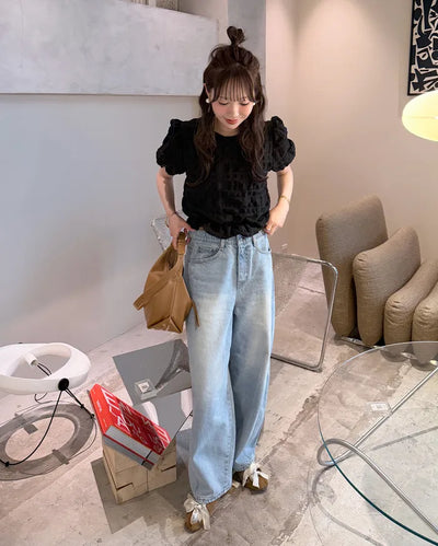 Side-point tapered denim pants