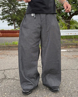 Side-tuck denim slacks