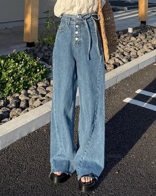 High-waisted denim pants with button strings