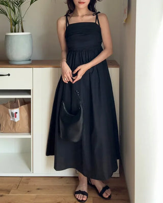 Side-tucked flared long dress