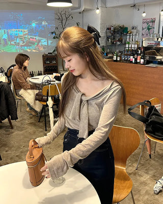 Tie-off shoulder knit