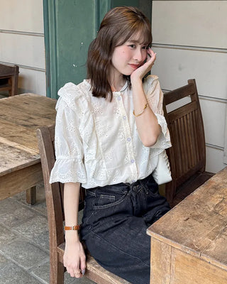Punched ruffle blouse