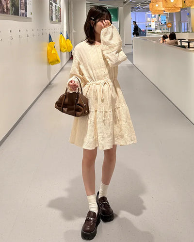 Shirred dress with strings