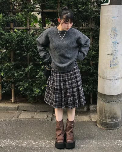 Checked pleated midi skirt