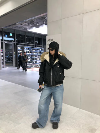 Fur-hooded studded parka