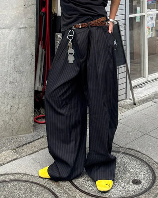 Double-pleated striped slacks