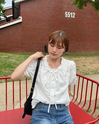 Flower embroidered blouse