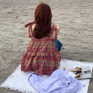 Checked sleeveless blouse