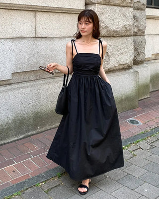 Side-tucked flared long dress