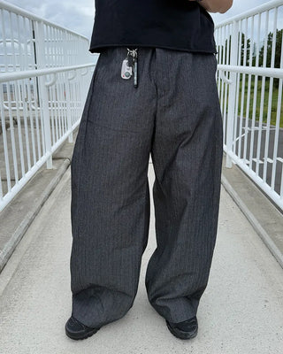Side-tuck denim slacks
