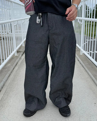 Side-tuck denim slacks