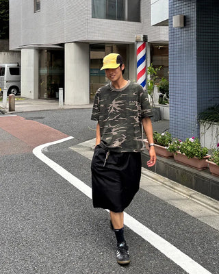 Double-pleated Bermuda shorts
