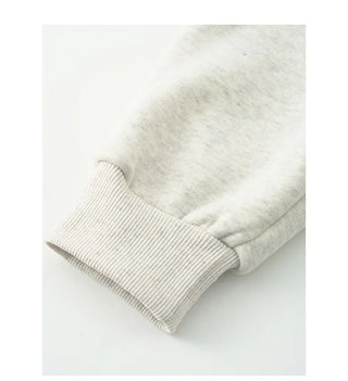Fleece-lined sweatshirt with floral embroidery
