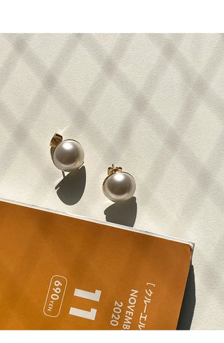 Round pearl earrings