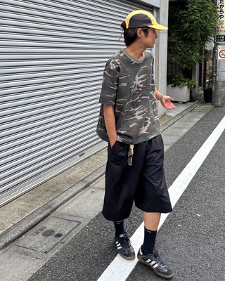 Double-pleated Bermuda shorts