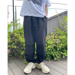 Two-pleat detail string pants