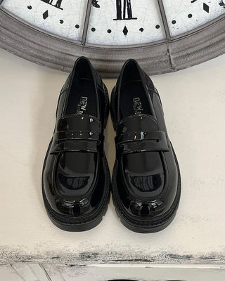Round-toe penny loafers