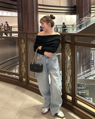 Wide-leg denim with side pleats