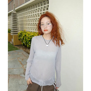 Sheer, languid long sleeveless top