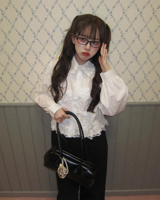 Flower embroidered peplum blouse