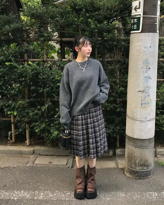 Checked pleated midi skirt