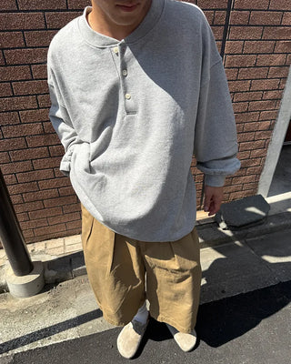 Henley neck sweatshirt