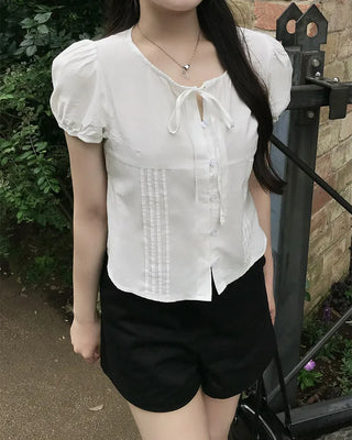 Pintuck puff sleeve ribbon tie blouse