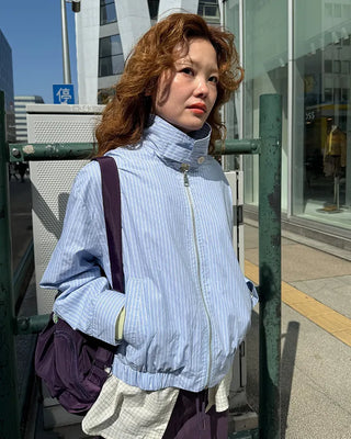 High-neck striped pattern blouson