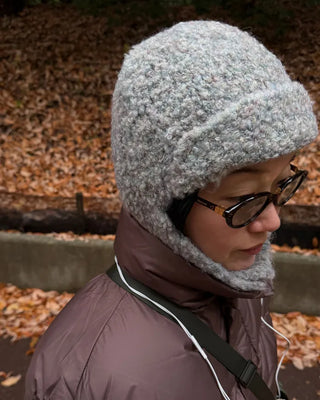 Knit hat with button ear flaps