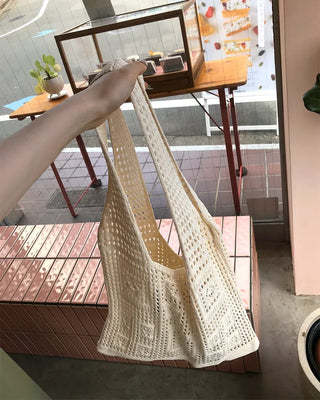 Perforated knit shoulder bag