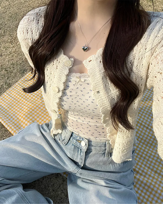 Wave punching cardigan