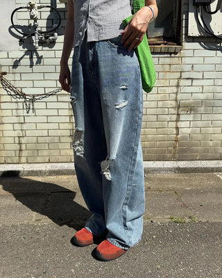 Distressed wide-leg denim pants
