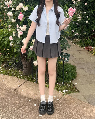 Big pleated mini skirt