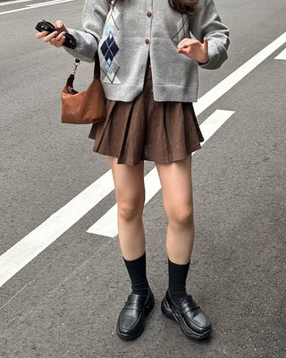Belted corduroy pleated mini skirt