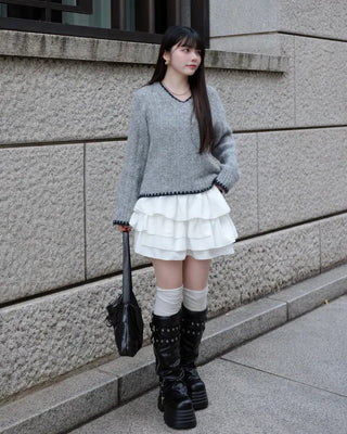 V-neck two-tone cable knit sweater