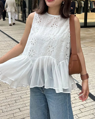 Perforated ruffle sleeveless top