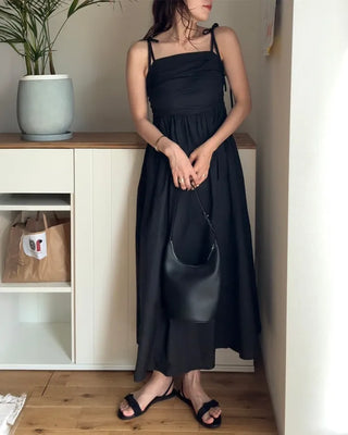 Side-tucked flared long dress