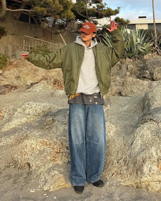 Pointed denim pants with contrasting panels