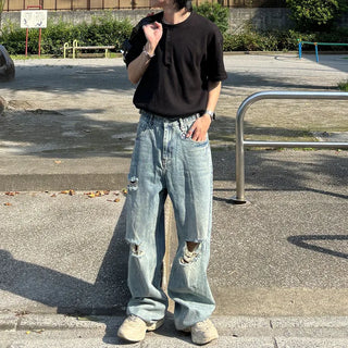 Distressed wide-leg denim pants