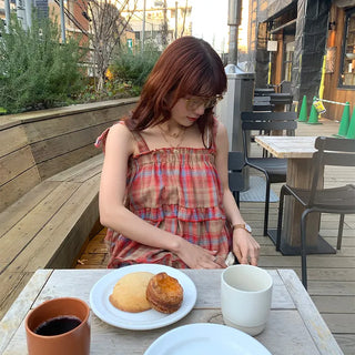 Checked sleeveless blouse