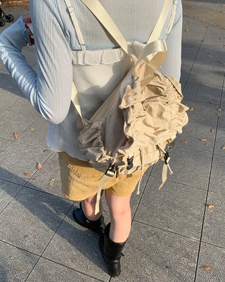 Shirring flap backpack