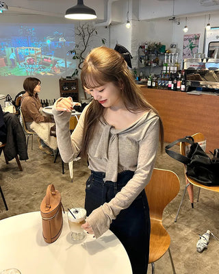 Tie-off shoulder knit
