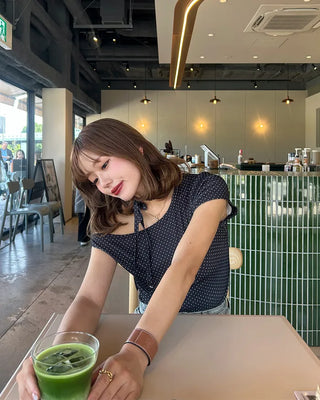Boat neck polka dot ribbon blouse