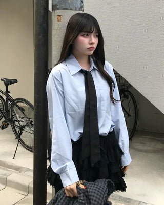 Tie-set loose-fit shirt blouse