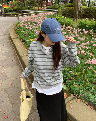 Striped knit polo shirt